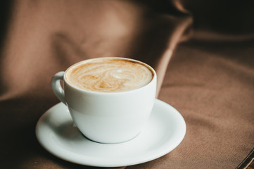 cup of coffee on table in cafe