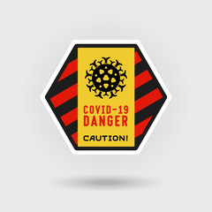 COVID-19 Coronavirus disease warning sign. Includes a stylized virus infection icon. The message warns of danger. Hexagonal shape design.