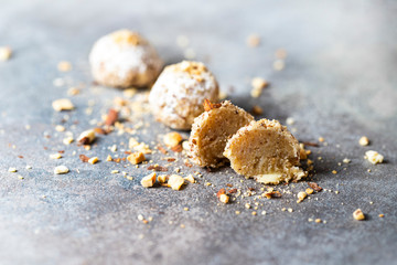 Vegan dessert, raw oatmeal nuts fruit bites prepared with natural ingredients.