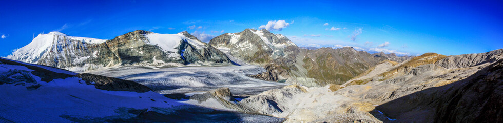 Dramatic panoramic view of the swiss alps as seen from the top of Barrhorn mountain at Canton...