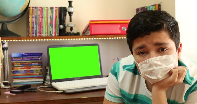 Home Isolation Concept  Epidemic Infection Covid-19 Distance Education At Home With Green Screen Laptop Monitor