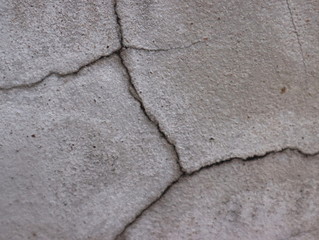 Texture background of concrete pavement with cracks.