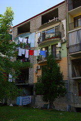 washed clothes hanging on ropes between houses in Batumi Georgia