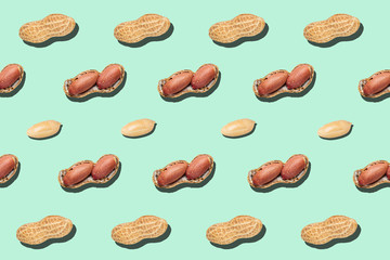 Peanuts pattern on light green background backdrop food nut texture