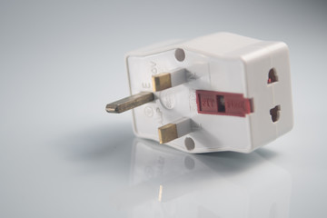 Three way electric socket isolated on white background