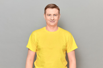 Obraz premium Portrait of mature man with happy expression and smiling