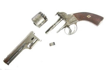 XIX century old rare muzzle loading percussion cap revolver pistol on white background