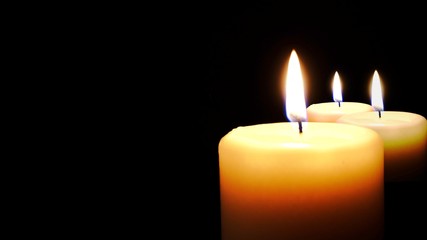 candle flame isolated on black.