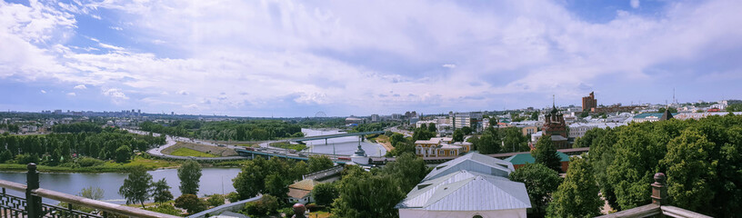Fototapeta na wymiar Yaroslavl. View from height. View from the monastery belfry of the Transfiguration monastery. Modern buildings in the old town