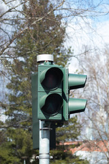 Not working traffic light with a pedestrian crossing.