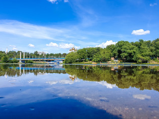 Fototapeta premium Cable-stayed bridge over the Kotorosl river in Yaroslavl. View from the island of Damansky.