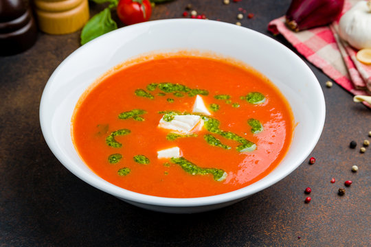 Soup cream of tomato with mozarella and pesto