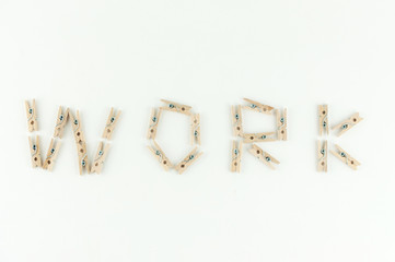 the word work from office clothespins, the concept of going to work for their vacation