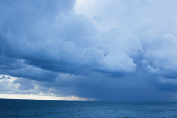 Naklejka na ściany i meble blue sky cloudy landscape, thunder on sea background