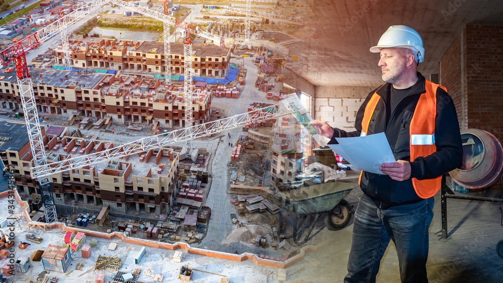Poster engineer with construction documentation in hand on the background of the construction site. constru
