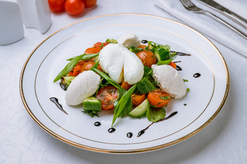 Vegetable salad with poached egg