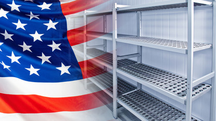 Empty shelves and an American flag. Shortage of goods in the United States. The panic from the outbreak of the coronavirus in America. Closing American stores. covid-19 in the United States.