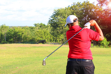 Fat golf players are using good golf clubs on the competition field.