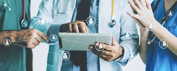 Group of doctor with tablet and graphic network - 343146808