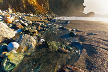 Limekiln Creek Flowing Into The Pacific Ocean at Limekiln Beach, Limekiln State Park, Big Sur, California, USA