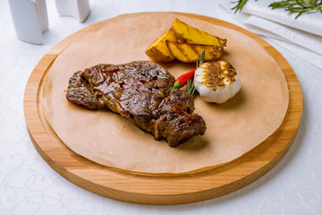 juicy Ribeye steak on white table