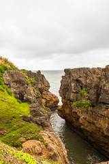 Fototapeta na wymiar Pancake Rocks. View of the Tasman Sea. Paparoa national park, South Island, New Zealand