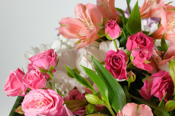 Colorful background of flowers close-up. Bouquet of roses, lilies and chrysanthemums.