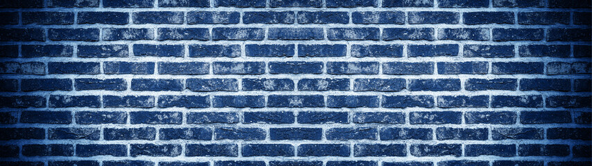 Dark blue rustic brick wall texture background banner panorama