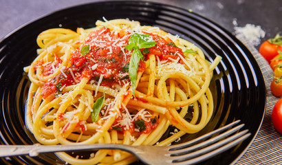 Delicious mouth-watering classic Italian pasta spaghetti with tomato sauce