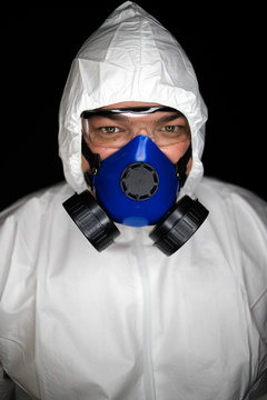 Close up portrait image of a health worker wearing protective clothing and masks working with Vaccines for dangerous viruses