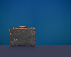 Beautiful antique wooden bag on blue wall and violet floor background, vintage, object, copy space