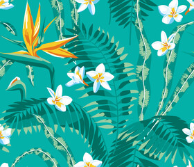 Seamless pattern of tropical leaves and flowers of plumeria and strelitzia on a turquoise background.