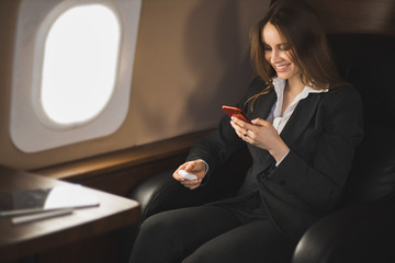 Attractive woman in private jet