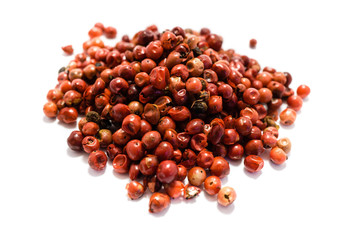 Pink pepper schinus isolated on white background