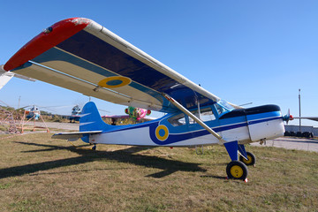 Obraz na płótnie Canvas light sport plane parked in the park of the air show
