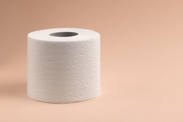 Toilet paper on light background. Toilet paper roll tissue. Health care concept. Coronavirus panic concept. People are stocking up toilet paper for home quarantine from coronavirus