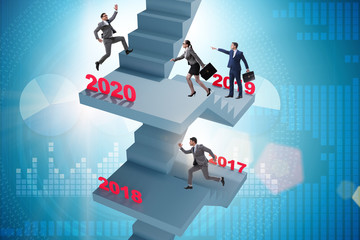 Businessman climbing stairs on yearly basis