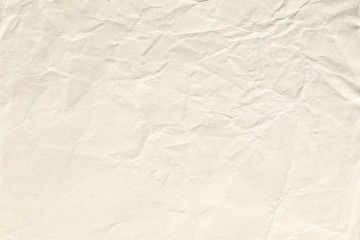 Old pale yellow crumpled paper background texture
