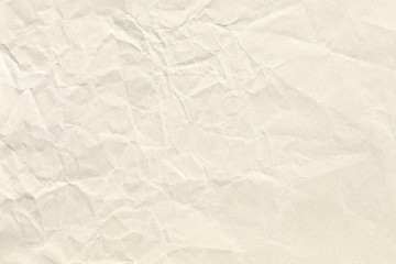 Old pale yellow crumpled paper background texture