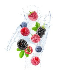 berry mix in water splash isolated on a white background © Iurii Kachkovskyi