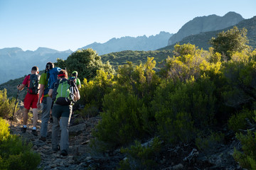 Fototapeta na wymiar Grupo de montañeros en el Parque Regional de la Sierra de Gredos, realizando la ruta desde Puente Pinillo al pico del Almanzor.