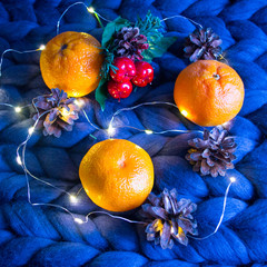 New year Christmas Christmas Flatley with tangerines candle garland and pine cone