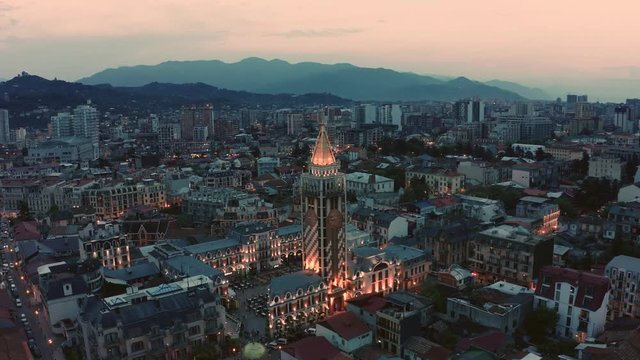 flight over of the Batumi city and Batumi Piazza, Georgia. Twilight over the old city and Downtown of Batumi - capital of Adjara, Georgia.