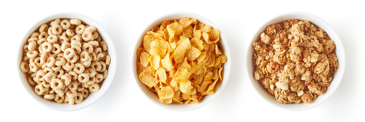 Three bowls of cereals isolated on white, from above