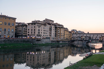 Fototapeta na wymiar Ponte Vecchio in Florence at the sunset