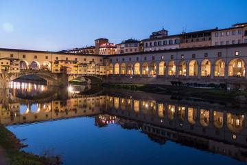 Fototapeta na wymiar Ponte Vecchio Brigde in Florence illuminated at night