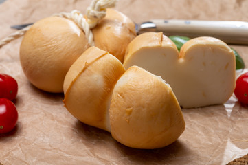 Italian semi hard handmade smoked scamorza cheese, from cow milk from Apulia or Calabria regions