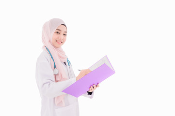 Beautiful muslim female doctor wearing white medical dressing gown with stethoscope