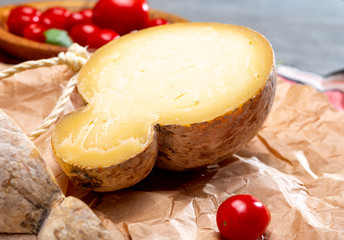 Italian semi hard matured caciocavallo cheese, handmade and aged in natural underground caves in Apulia region