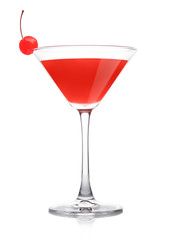 Cosmopolitan cocktail in classic crystal glass with pink cherry on white.